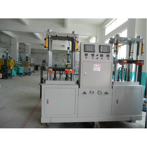 Double-station four-column top hydraulic press