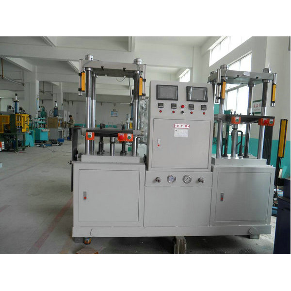 Double-station four-column oil hydraulic press